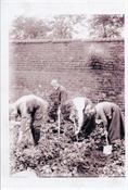 Photograph, modern print, of Baker family members in garden.