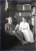 Glass negative of  Harry and Pollie Baker seated on sofa