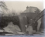 Glass negative of building work at Beaconfield