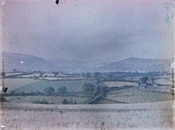 Glass plate, coloured, of view over fields