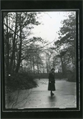Print from glass negative showing Margaret Baker on frozen pond