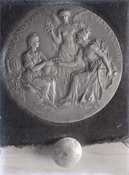 Glass negative of a medal