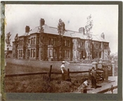 Photograph of Epworth House on page from album