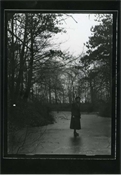 Print from glass slide showing Margaret Baker on frozen pond