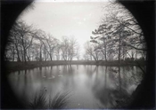 Glass negative of pond at Beaconfield House