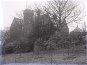 Glass negative of view of Beaconfield House.